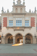 Poland, Kraków, Sukiennice Cloth Hall, passageway seen against daylight in the morning