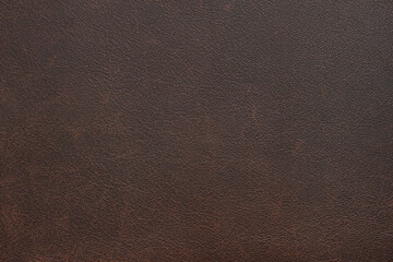 Genuine, natural, artificial brown leather texture background. Luxury material for header, banner, backdrop, wallpaper, clothes, furniture and interior design. ecological friendly leatherette.