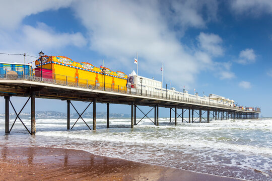 Fototapeta A blustery spring day at Paignton beach and pier in  Devon England