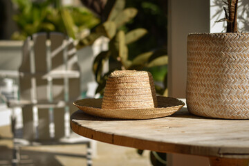 Caribbean straw hat on a wooden table, Dominican Republic. Las terrenas.