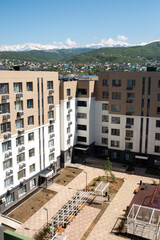 the yard of a new building of a house with a playground. construction site