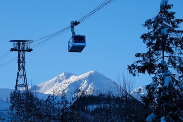 Ropeway to Kasprowy Wierch Peak in Tatras Mountains in beautiful winter scenery in morning light, famous place in Tatras, Poland. Tatra National Park