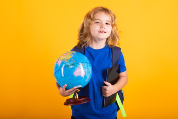 Fototapeta premium School boy world globe and tablet. Smart caucasian school boy kid pupil student going back to school. Education kids.