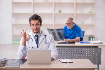 Two male doctors in telemedicine concept