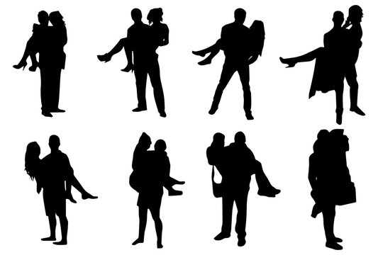 Full length of silhouette couples carring