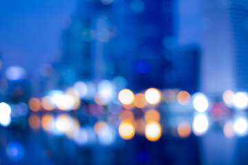 Abstract bokeh night in city background, cityscape at twilight time blurred photo