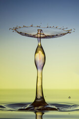 Water drop falling and colliding with another one	