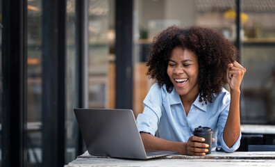 Excited happy african american woman feeling happy rejoicing online win got new job opportunity...