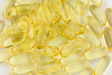 Omega 3 fish oil in yellow capsules