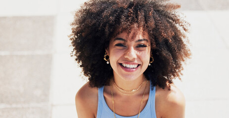 Portrait, black woman and smile in city, sunshine and girl on break, town and casual with happiness. Afro, African American female and face outside, happy and weekend to relax, carefree and freedom