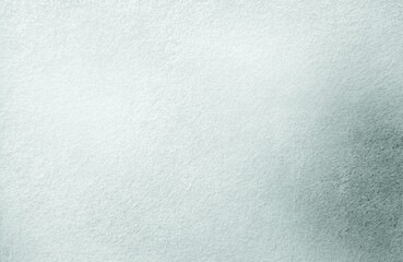 An abstract graphic design of a clean cement surface background or a blank canvas in a gray-green beige gradient.