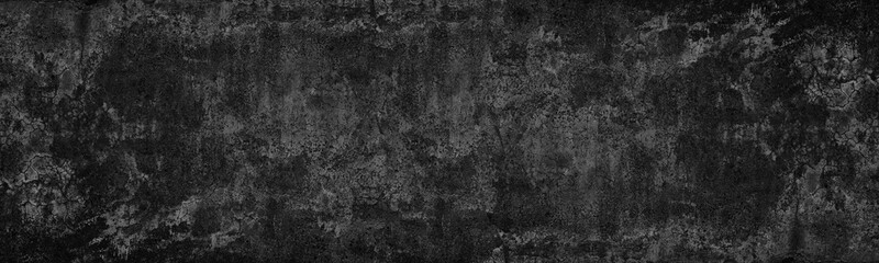 Black weathered concrete wall. Dark rough old cement distressed wide texture. Grunge textured...