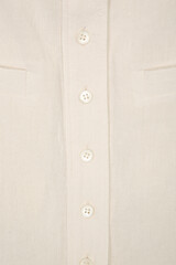 white fabric with buttons