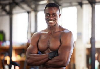 Happy, fitness and portrait of man at gym proud, smile and relax with empowered, mindset and...