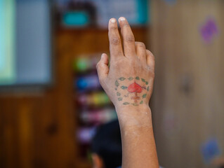 child's hands. detail. interior photo.