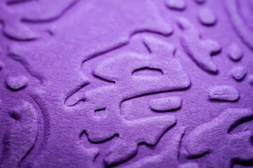 Extreme macro of embossed purple paper