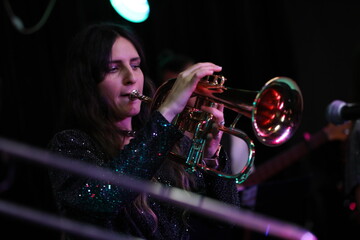 Female musician playing the trumpet