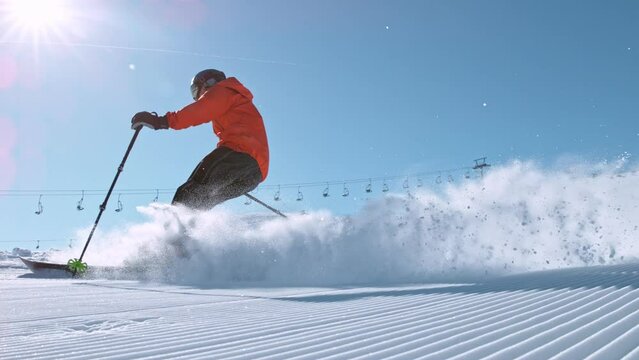 Super slow motion of piste skier running down. Filmed on high speed cinema camera, 1000fps. Speed ramp effect.