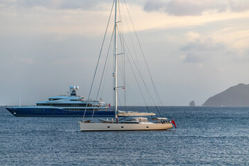 Obraz premium Mega Yachts anchored in Indian Bay, Saint Vincent and the Grenadines