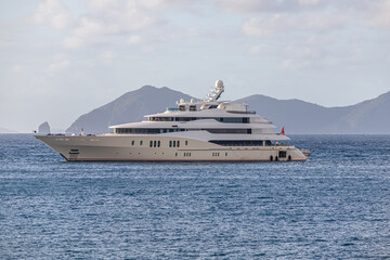 Fototapeta na wymiar Mega Yachts anchored in Indian Bay, Saint Vincent and the Grenadines