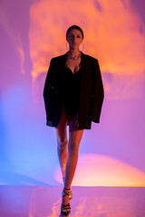 beautiful tall girl on a colored background