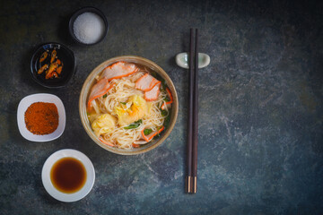 egg noodles with pork wonton soup or pork dumplings soup and vegetable - Asian food style