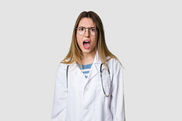 Compassionate female physician with a stethoscope around her neck, ready to diagnose and care for...