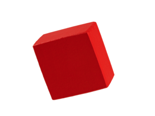 geometric figures made of wood, painted and stacked on a table, isolated