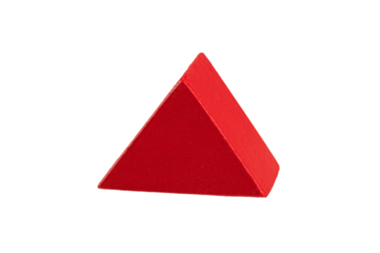 geometric figures made of wood, painted and stacked on a table, isolated