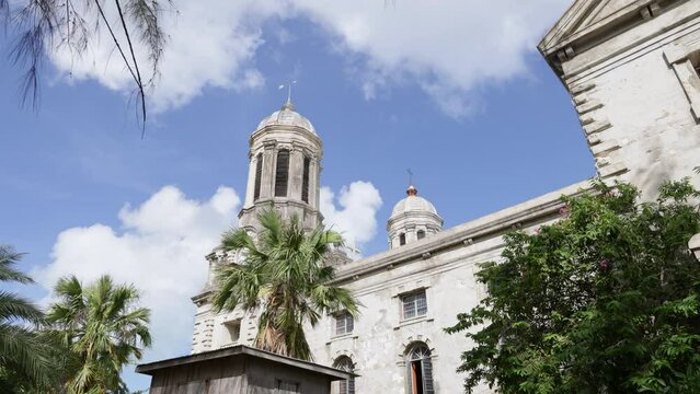 Time Lapse - Clouds pass quickly over twin towers of St. John's Cathedral, also known as the St. John the Divine, the Cathedral Church of the Diocese of North Eastern Caribbean and Aruba
