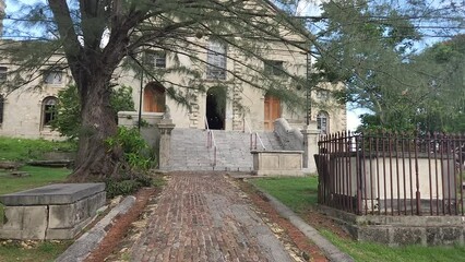 Garden path to the doors to St. John's cathedral - trade wind blowing the flowers and vegetation