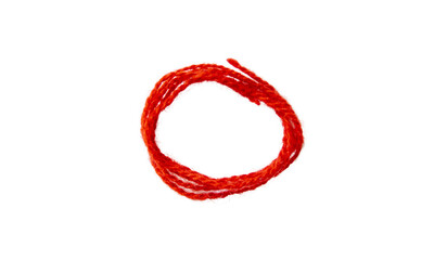 Red thread isolate on white background. Selective focus. Old.