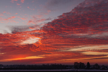 Red sunrise during a frosty morning