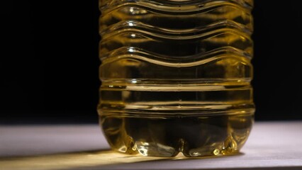 Sunflower or olive oil in a bottle, close-up - Powered by Adobe