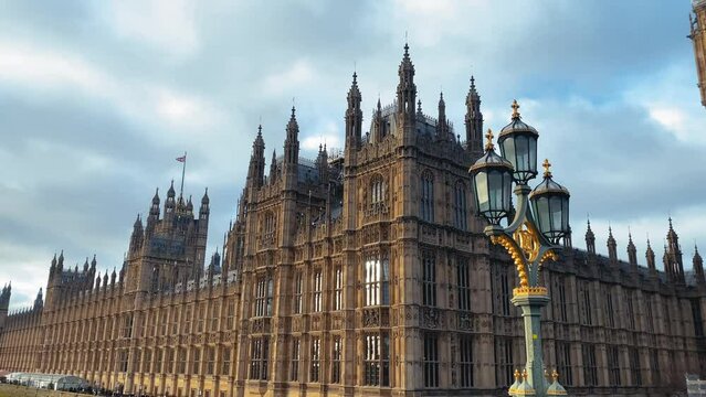 Big Ben pan left to Palace of Westminster