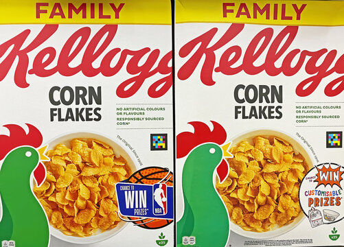 Viersen, Germany - January 9. 2023: Closeup of family boxes Kellogg corn flakes in shelf of german store