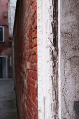 Close up view of the Fondamenta Tolentino street photo. Street scene, old wall.