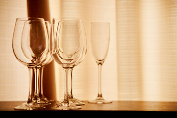 A row of empty champagne glasses. empty glasses for champagne and wine. soft focus