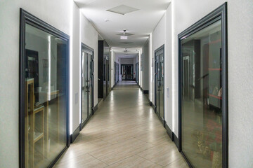 A corridor in an urban-type office building. Modern interior of the lobby of an office building...