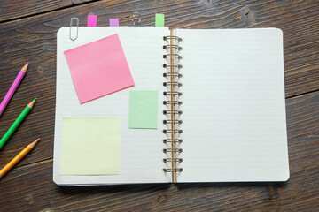 Spiral notebook  for notes on rustic table. Copy space