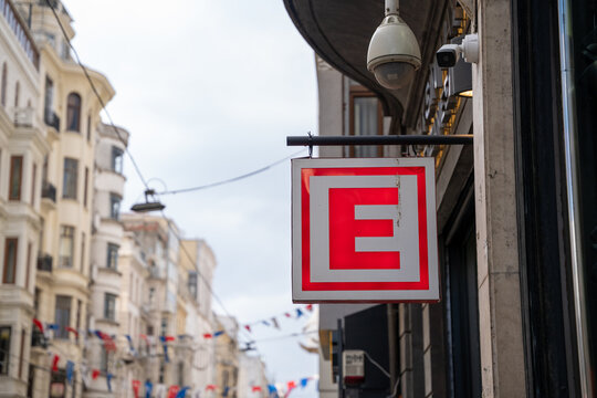 Istanbul, Turkey - February 10, 2023: Turkish Pharmacy Symbol "E" on Istiklal Street