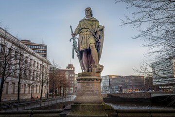 Fototapeta premium Adolf III of Holstein Statue at Trostbrucke Bridge - Hamburg, Germany