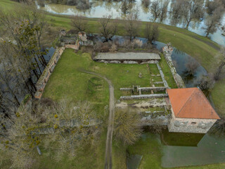Aerial view of Onod castle in Borsod county, square shape four tower stronghold, cloudy sky