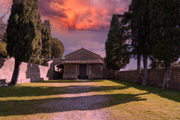 Fototapeta na wymiar church of san niccolo at sunset in the town of cortona tuscany