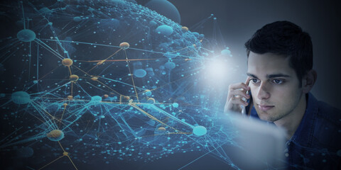 young man with mobile phone and computer working with artificial intelligence and digital networks