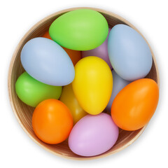 happy Easter decorations, basket full of colored easter eggs in pastel light colors, top view on...