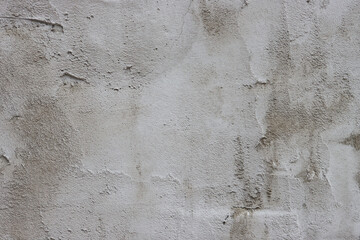 The wall is covered with rough putty.