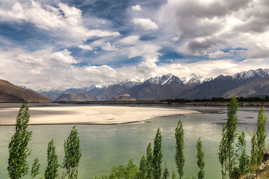 Indus river turning at skardu - the sand and turquoise water 
