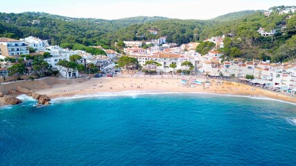 Fototapeta na wymiar aerial view of the beautiful spanish town of Tamariu in a bay on the Mediterranean Sea with a promenade and a beach, Catalonia, Costa Brava, Girona