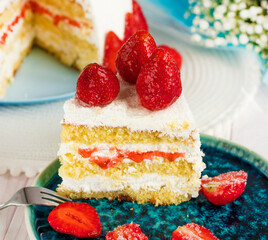 selective focus. festive berry cake. homemade strawberry cake cut. Strawberry pie decorated with fresh strawberries stands on a plate. Ice cream and strawberry cream. Cut off a piece. 